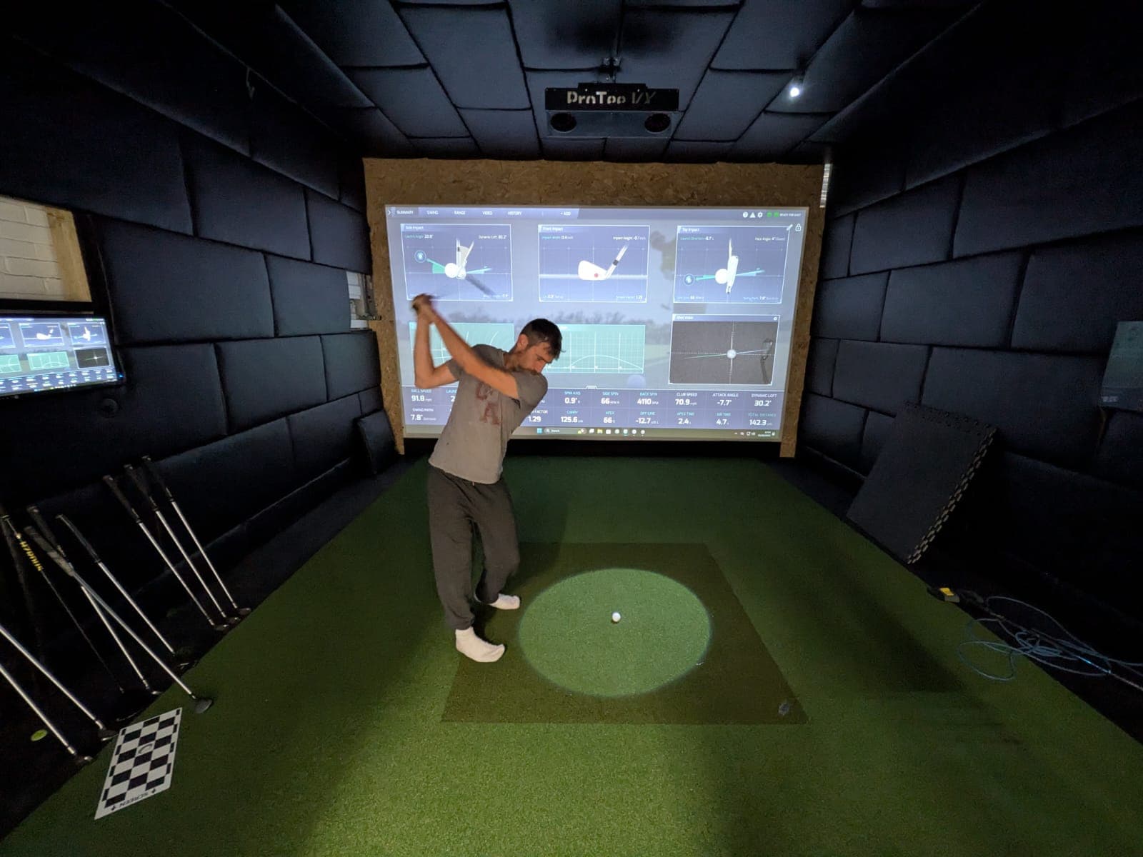 Simulator bay, launch monitor data on screen